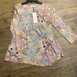 Paisley print.  Waist tapered with embellishments